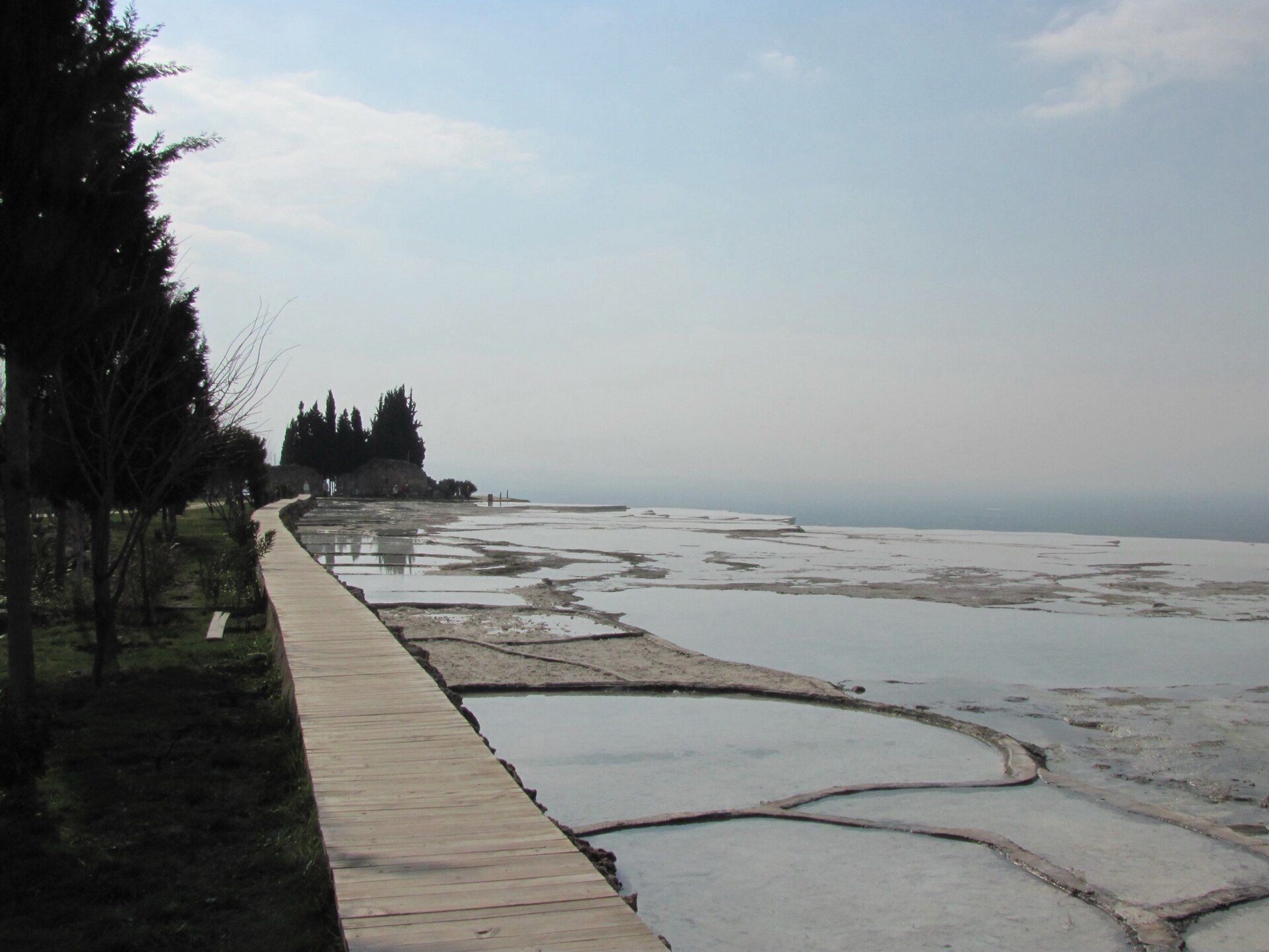 White travertine terraces cascading down the hillside at Pamukkale
