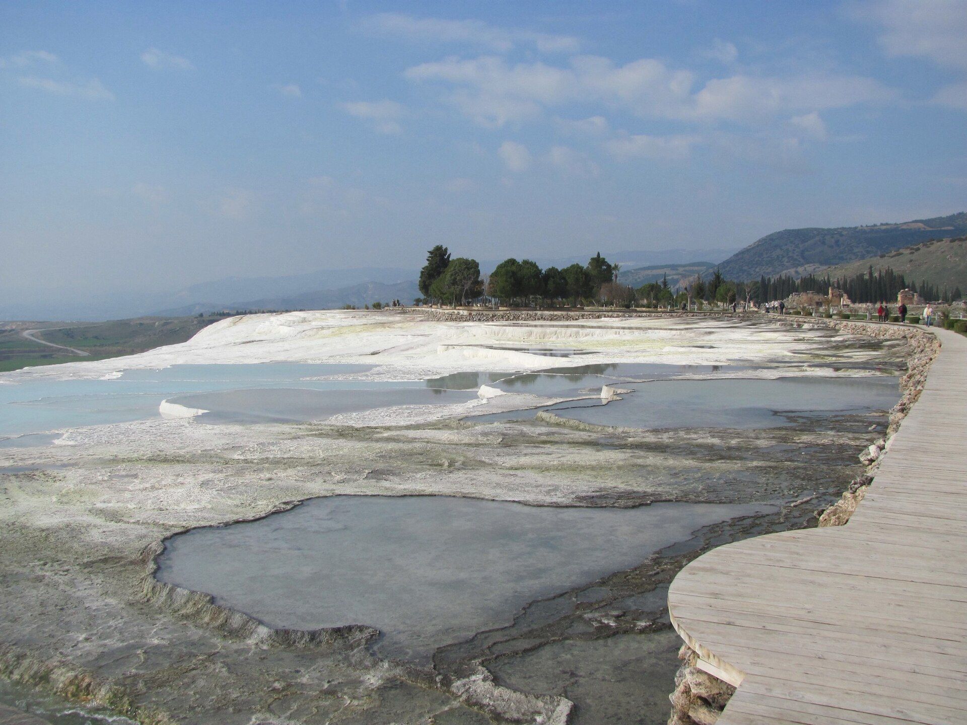 Stepped white travertine pools at Pamukkale, Turkey