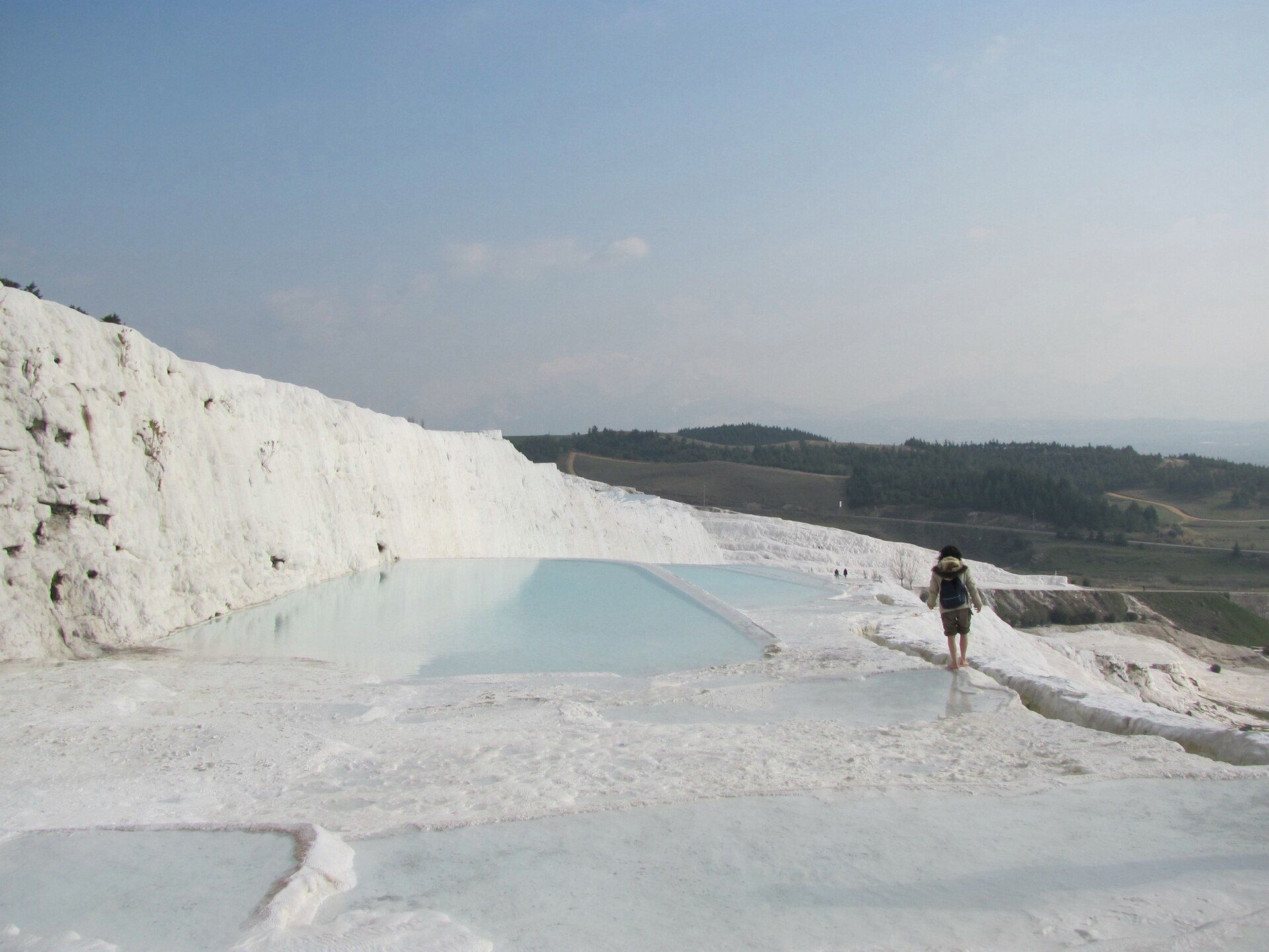 The white travertine terraces of Pamukkale catching the light