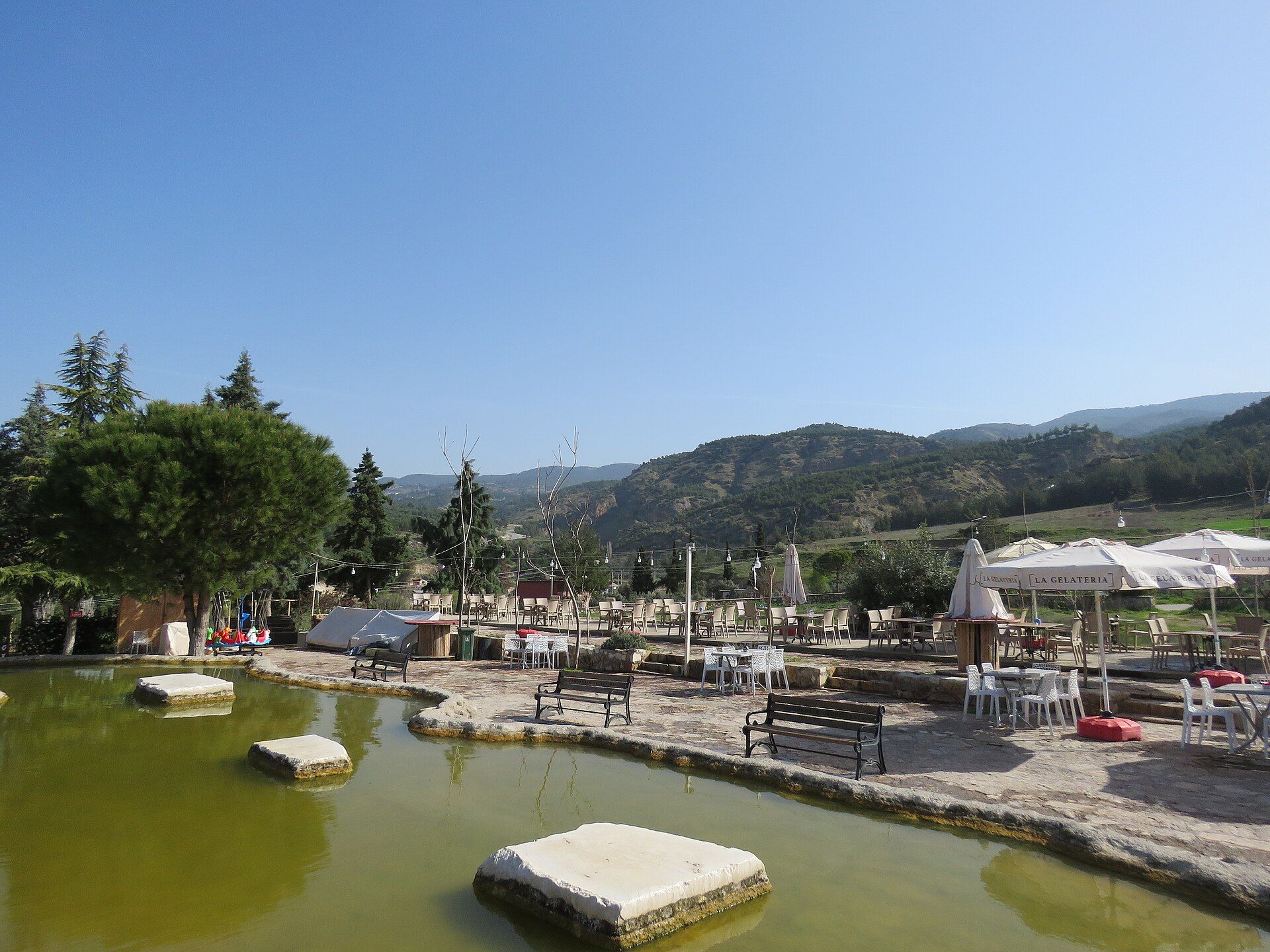 Colourful red-orange mineral pools at Karahayıt's red springs