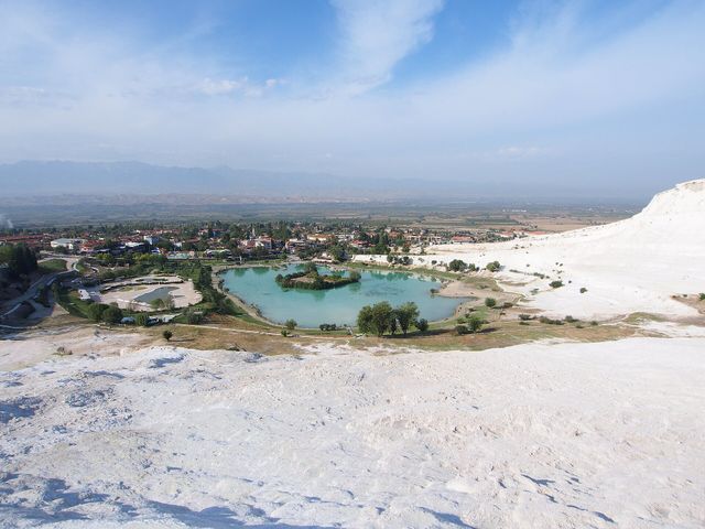 Pamukkale village below the white travertine terraces